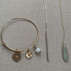 Set of two lariat necklacess and a charm bracelet